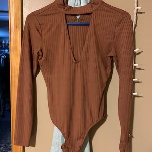 Rust colored body suit